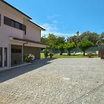 Em