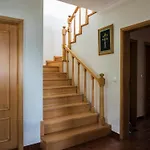 Em